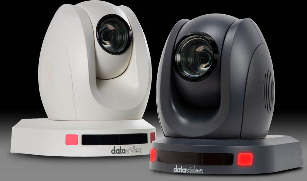 Two PTZ cameras with controller on a desk