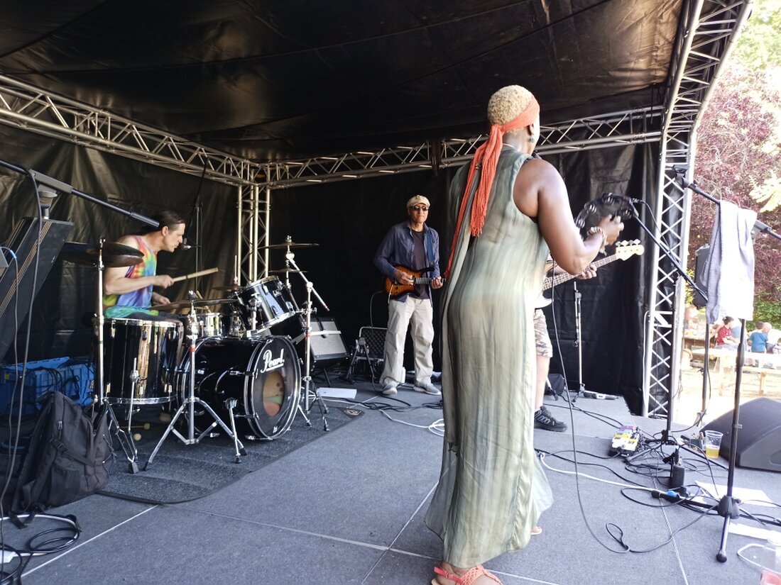 Mobile stage cover with festival lighting