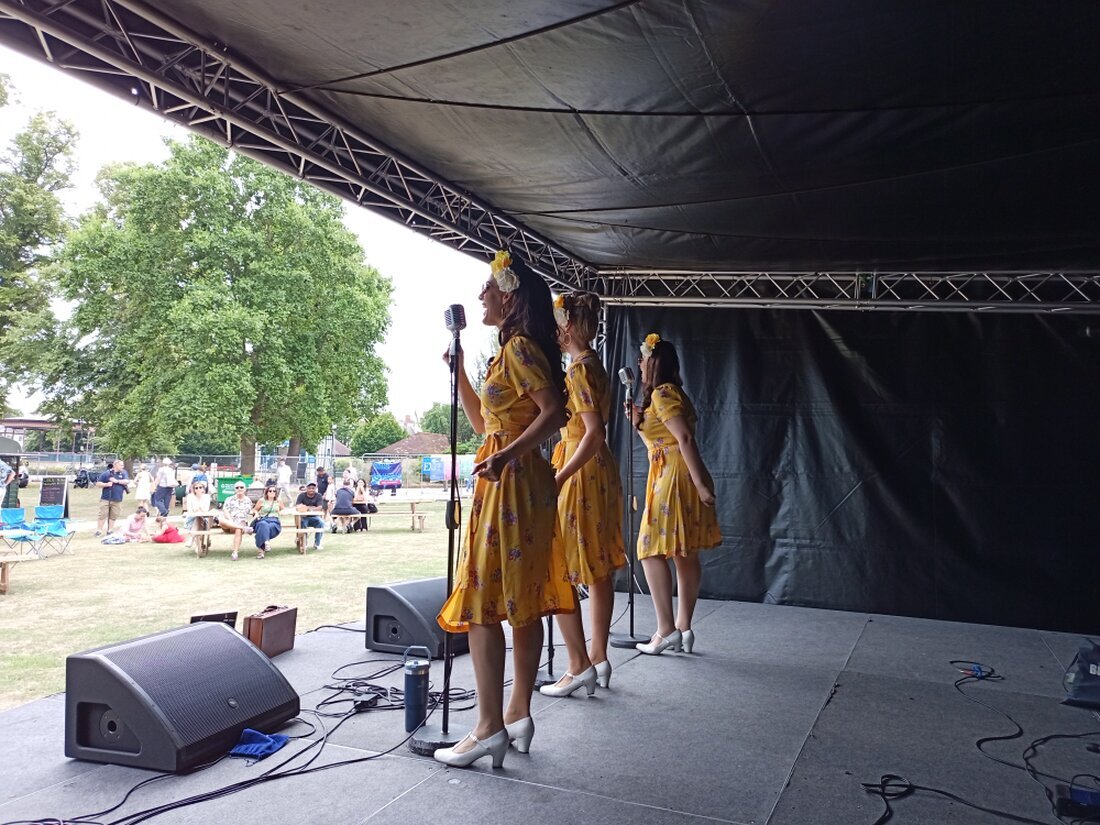 Small outdoor stage with canopy at a village fete