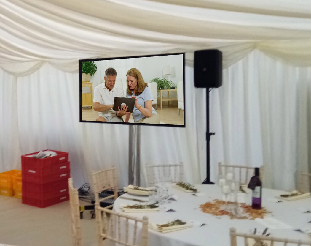 Camera on tripod filming a performance